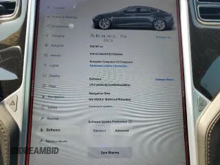 2014 Tesla Model S 60 z VIN 5YJSA1H11EFP64764, wystawiony jako Copart lot #64265815 z przebiegiem 126 191 mil mil oraz Szkoda całkowita • Salvage title. Historia ofert i sprzedaży dostępna na DreamBid. Obrazek 9.