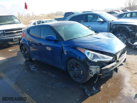 2017 Hyundai Veloster with VIN KMHTC6AD0HU319214, listed as a IAAI auction lot 41345407 with 99,214 mi miles. Bid and sale history available at carsss.com. Image 1.