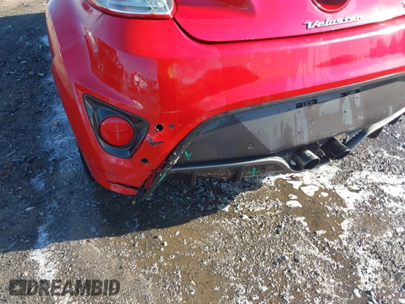 2013 Hyundai Veloster Turbo z VIN KMHTC6AE3DU169229, wystawiony jako IAAI lot #42087798 z przebiegiem 120 741 mil mil oraz . Historia ofert i sprzedaży dostępna na DreamBid. Obrazek 18.
