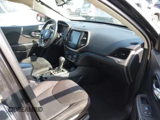 2016 Jeep Cherokee Altitude z VIN 1C4PJLCB5GW208005, wystawiony jako IAAI lot #42120987 z przebiegiem 179 423 mil mil oraz . Historia ofert i sprzedaży dostępna na DreamBid. Obrazek 5.