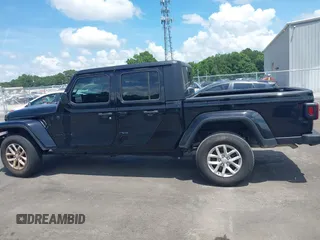 2023 Jeep Gladiator Sport S with VIN 1C6HJTAGXPL543319, listed as a IAAI auction lot 42499587 with 45,140 mi miles and . Bid and sale history available at DreamBid. Image 14.