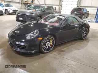 2019 Porsche 911 Turbo S with VIN WP0CD2A9XKS144611, listed as a Copart auction lot 77636924 with 62,657 mi miles and Salvage Title. Bid and sale history available at carsss.com. Image 1.