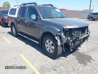 2007 Nissan Frontier SE z VIN 1N6AD07UX7C421585, wystawiony jako IAAI lot #42311742 z przebiegiem 166 400 mil mil oraz . Historia ofert i sprzedaży dostępna na DreamBid. Obrazek 1.