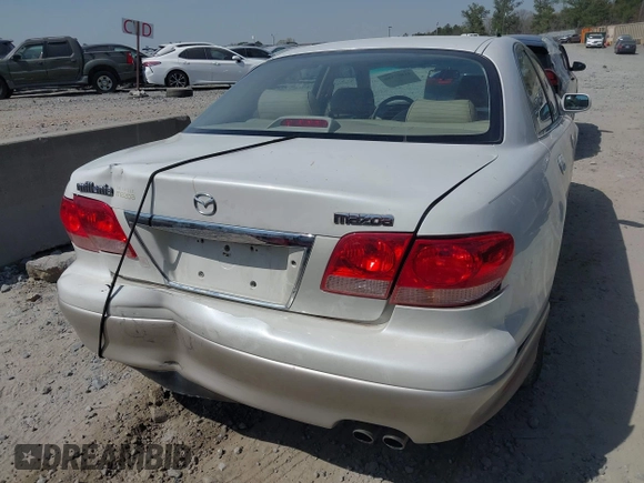 2001 Mazda Millenia with VIN JM1TA221011711379, listed as a IAAI auction lot 41897580 with 151,307 mi miles and . Bid and sale history available at DreamBid. Image 6.
