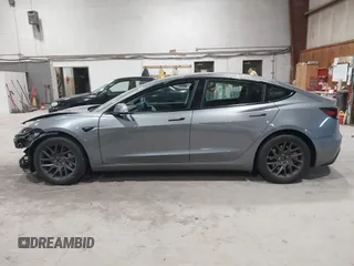 2024 Tesla Model 3 Long Range with VIN 5YJ3E1EB0RF860736, listed as a IAAI auction lot 41966827 with 5,134 mi miles and . Bid and sale history available at DreamBid. Image 15.