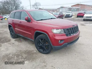 2013 Jeep Grand Cherokee Laredo with VIN 1C4RJEAG4DC573971, listed as a IAAI auction lot 41627288 with 143,256 mi miles. Bid and sale history available at carsss.com. Image 1.