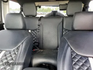 2015 Jeep Wrangler Unlimited Sport with VIN 1C4BJWDG9FL759012, listed as a Copart auction lot 61002465 with 101,395 mi miles and Salvage title. Bid and sale history available at DreamBid. Image 10.