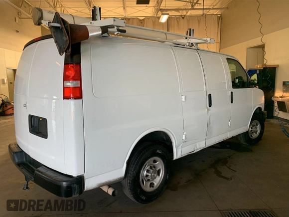 2020 Chevrolet Express Cargo Van with VIN 1GCWGAFPXL1253115, listed as a IAAI auction lot 42175676 with 93,050 mi miles. Bid and sale history available at carsss.com. Image 1.