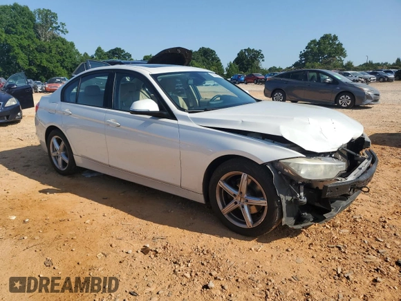 2014 BMW 3 Series 328i xDrive with VIN WBA3B5C51EF958576, listed as a Copart auction lot 62089375 with 148,140 mi miles and Salvage title. Bid and sale history available at DreamBid. Image 4.