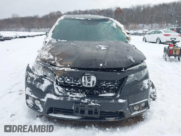 2019 Honda Passport Sport with VIN 5FNYF8H20KB019366, listed as a IAAI auction lot 41155033 with 79,250 mi miles and . Bid and sale history available at DreamBid. Image 12.
