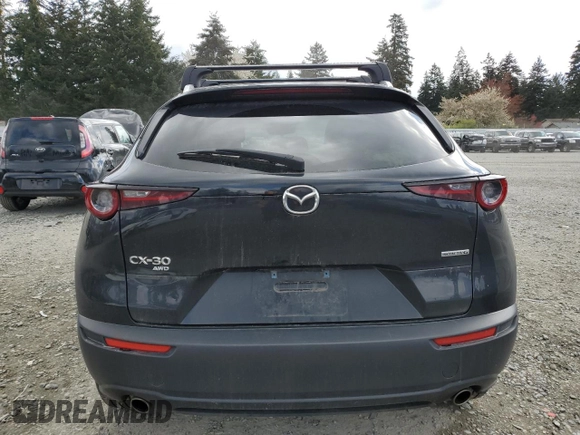 2023 Mazda CX-30 S Select z VIN 3MVDMBBM5PM533145, wystawiony jako Copart lot #53664995 z przebiegiem 45 775 mil mil oraz Szkoda całkowita • Salvage title. Historia ofert i sprzedaży dostępna na DreamBid. Obrazek 6.