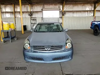2005 Infiniti G35 with VIN JNKCV51E15M216377, listed as a Copart auction lot 57979994 with 147,084 mi miles and Salvage Title. Bid and sale history available at DreamBid. Image 11.
