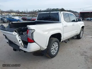 2024 Toyota Tacoma 4WD SR5 with VIN 3TYLB5JN0RT016910, listed as a IAAI auction lot 41586142 with 6,127 mi miles. Bid and sale history available at carsss.com. Image 4.
