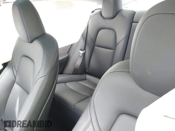 2023 Tesla Model 3 with VIN 5YJ3E1EA4PF644621, listed as a IAAI auction lot 42280312 with 41,262 mi miles and . Bid and sale history available at DreamBid. Image 8.