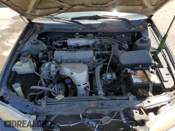 2001 Toyota Camry CE z VIN 4T1BG22K81U783489, wystawiony jako Copart lot #57893115 z przebiegiem 154 352 mil mil oraz Czysty tytuł • Clean title. Historia ofert i sprzedaży dostępna na DreamBid. Obrazek 11.