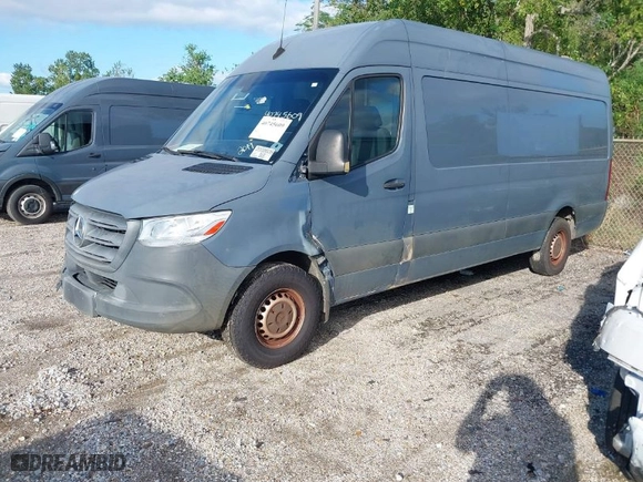 2019 Mercedes-Benz Sprinter Cargo Van with VIN WD4PF1CD1KP126367, listed as a IAAI auction lot 40745609 with 140,903 mi miles. Bid and sale history available at carsss.com. Image 2.