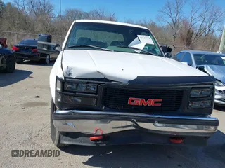 1996 GMC Sierra 1500 with VIN 1GTGC33R4TF018147, listed as a IAAI auction lot 41612770 with 106,443 mi miles and . Bid and sale history available at DreamBid. Image 6.