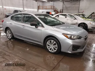 2019 Subaru Impreza with VIN 4S3GKAB63K3600089, listed as a IAAI auction lot 41849888 with 48,397 mi miles. Bid and sale history available at carsss.com. Image 1.