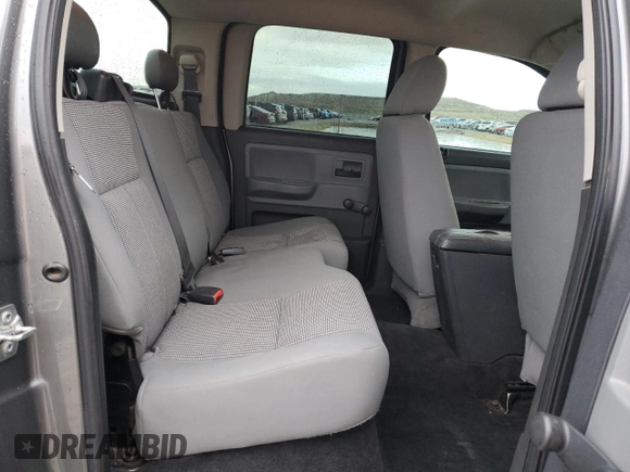 2011 Dodge Dakota с VIN 1D7RE2GK1BS585647, выставлен на аукционе Copart как лот 87689035 с пробегом 190 947 миль миль и Списание • Salvage title. История ставок и продаж доступна на DreamBid. Изображение 10.