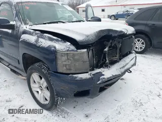 2007 Chevrolet Silverado 1500 LTZ with VIN 2GCEK13M771535698, listed as a IAAI auction lot 41295982 with 216,232 mi miles. Bid and sale history available at carsss.com. Image 6.