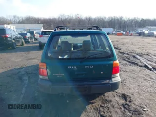 1999 Subaru Forester L with VIN JF1SF635XXH735202, listed as a IAAI auction lot 41489355 with 290,000 mi miles. Bid and sale history available at carsss.com. Image 16.