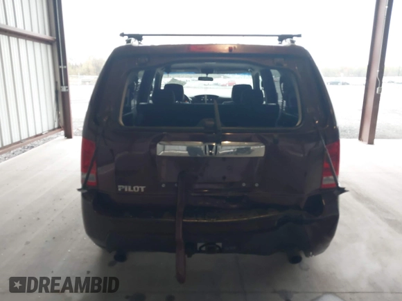 2009 Honda Pilot EX with VIN 5FNYF48499B005597, listed as a IAAI auction lot 41975121 with 309,769 mi miles. Bid and sale history available at carsss.com. Image 16.