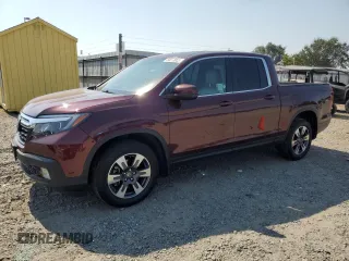 2019 Honda Ridgeline RTL with VIN 5FPYK3F52KB039850, listed as a Copart auction lot 64013955 with 75,366 mi miles and Salvage title. Bid and sale history available at DreamBid. Image 1.