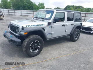 2024 Jeep Wrangler Rubicon with VIN 1C4RJXR61RW224506, listed as a IAAI auction lot 42111434 with 33,689 mi miles and . Bid and sale history available at DreamBid. Image 19.