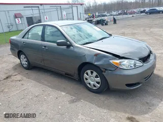 2004 Toyota Camry LE with VIN 4T1BE32K04U853924, listed as a IAAI auction lot 42114407 with 246,272 mi miles. Bid and sale history available at carsss.com. Image 1.