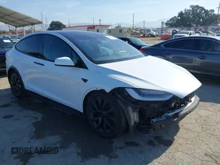 2022 Tesla Model X Plaid z VIN 7SAXCBE63NF337529, wystawiony jako IAAI lot #42066904 z przebiegiem 56 933 mil mil oraz . Historia ofert i sprzedaży dostępna na DreamBid. Obrazek 1.