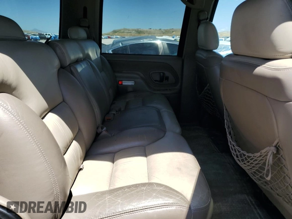 2000 Chevrolet Tahoe Z71 с VIN 1GNEK13R3YR116047, выставлен на аукционе Copart как лот 60037735 с пробегом 174 428 миль миль и Списание • Salvage title. История ставок и продаж доступна на DreamBid. Изображение 11.