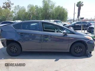 2015 Toyota Prius Four with VIN JTDKN3DU9F0473025, listed as a IAAI auction lot 42425733 with 124,196 mi miles and . Bid and sale history available at DreamBid. Image 13.