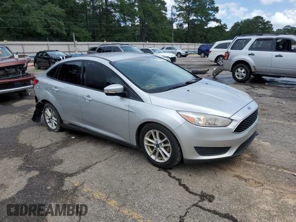 2017 Ford Focus SE with VIN 1FADP3F29HL242325, listed as a Copart auction lot 61153555 with 136,666 mi miles and Salvage title. Bid and sale history available at DreamBid. Image 4.