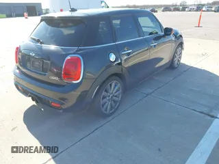 2015 MINI Hardtop 4 Door S with VIN WMWXU3C57FT892179, listed as a IAAI auction lot 42092010 with 95,156 mi miles and . Bid and sale history available at DreamBid. Image 4.