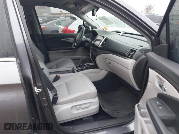 2017 Honda Pilot EX-L with VIN 5FNYF6H55HB063063, listed as a IAAI auction lot 41491193 with 75,444 mi miles and . Bid and sale history available at DreamBid. Image 5.