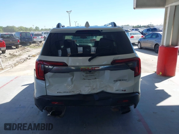 2021 GMC Acadia AT4 with VIN 1GKKNLLS0MZ102445, listed as a IAAI auction lot 41827776 with 105,336 mi miles. Bid and sale history available at carsss.com. Image 16.