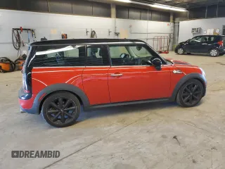 2014 MINI Clubman S z VIN WMWZG3C52ET800765, wystawiony jako Copart lot #76470874 z przebiegiem 103 971 mil mil oraz Szkoda całkowita • Salvage title. Historia ofert i sprzedaży dostępna na DreamBid. Obrazek 3.
