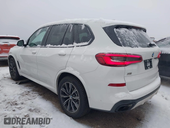 2020 BMW X5 M50i with VIN 5UXJU4C09LLE45658, listed as a IAAI auction lot 41307154 with 69,936 mi miles and . Bid and sale history available at DreamBid. Image 3.
