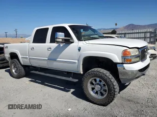 2002 GMC Sierra 1500HD SLE z VIN 1GTGK13U22F213058, wystawiony jako Copart lot #67418174 z przebiegiem 178 940 mil mil oraz Szkody całkowita. Historia ofert i sprzedaży dostępna na DreamBid. Obrazek 4.