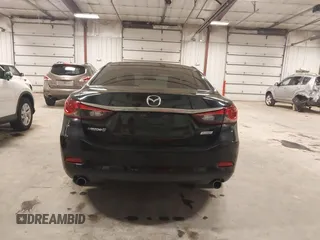2016 Mazda 6 i Sport with VIN JM1GJ1U57G1433732, listed as a IAAI auction lot 41879844 with 107,269 mi miles and . Bid and sale history available at DreamBid. Image 16.
