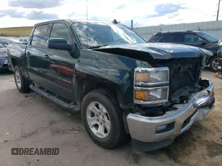 2015 Chevrolet Silverado 1500 LT with VIN 3GCUKREC5FG220516, listed as a Copart auction lot 68086854 with 186,924 mi miles and Salvage Title. Bid and sale history available at DreamBid. Image 4.
