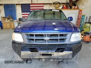 1997 Ford F-150 z VIN 1FTDF18W0VLB11829, wystawiony jako Copart lot #69103414 z przebiegiem 291 277 mil mil oraz Czysty tytuł • Clean title. Historia ofert i sprzedaży dostępna na DreamBid. Obrazek 5.