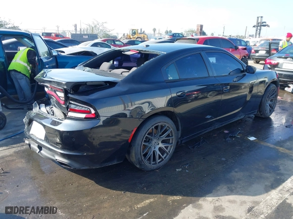 2017 Dodge Charger SE with VIN 2C3CDXBG8HH515103, listed as a IAAI auction lot 41599588 with 128,805 mi miles. Bid and sale history available at carsss.com. Image 4.