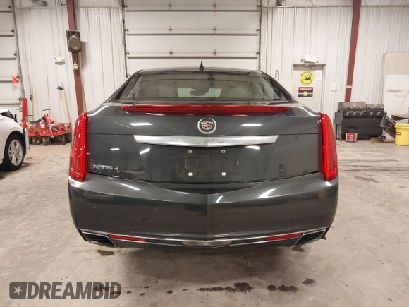 2013 Cadillac XTS Luxury with VIN 2G61R5S32D9101909, listed as a IAAI auction lot 41461611 with 110,603 mi miles. Bid and sale history available at carsss.com. Image 16.