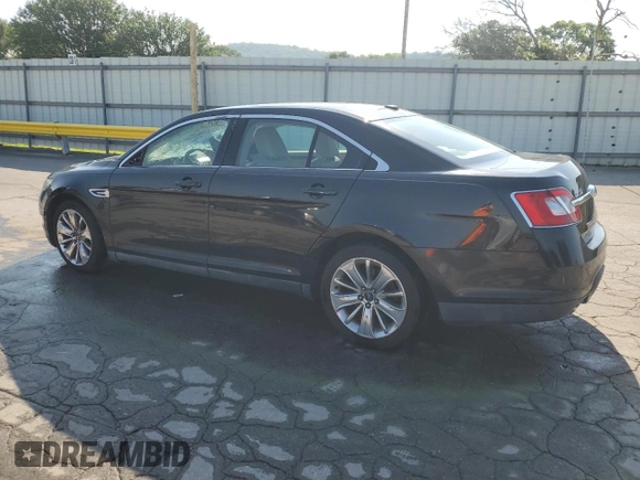 2010 Ford Taurus Limited with VIN 1FAHP2FW3AG164556, listed as a Copart auction lot 62024345 with 153,320 mi miles and Salvage title. Bid and sale history available at DreamBid. Image 2.