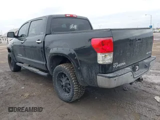 2012 Toyota Tundra 4WD Truck LTD with VIN 5TFHW5F19CX218772, listed as a IAAI auction lot 41472955 with 134,928 mi miles. Bid and sale history available at carsss.com. Image 3.