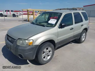 2005 Ford Escape XLT with VIN 1FMCU03165DA08296, listed as a IAAI auction lot 41677892 with 255,431 mi miles. Bid and sale history available at carsss.com. Image 2.