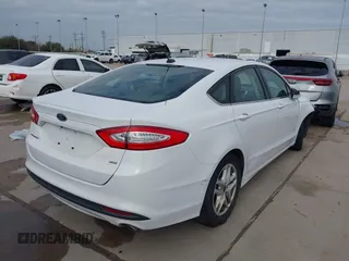 2016 Ford Fusion SE with VIN 3FA6P0H73GR358152, listed as a IAAI auction lot 41215591 with 186,481 mi miles. Bid and sale history available at carsss.com. Image 4.