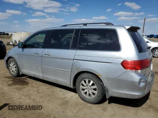 2010 Honda Odyssey EX-L with VIN 5FNRL3H60AB501157, listed as a Copart auction lot 54698995 with 277,974 mi miles and Salvage Title. Bid and sale history available at carsss.com. Image 2.
