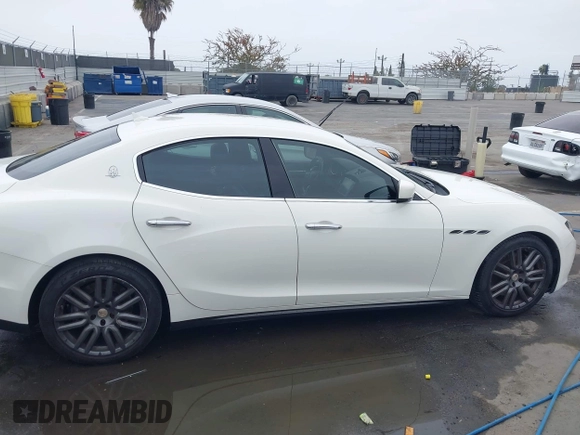 2015 Maserati Ghibli z VIN ZAM57XSA3F1154376, wystawiony jako IAAI lot #42373053 z przebiegiem 81 523 mil mil oraz . Historia ofert i sprzedaży dostępna na DreamBid. Obrazek 13.